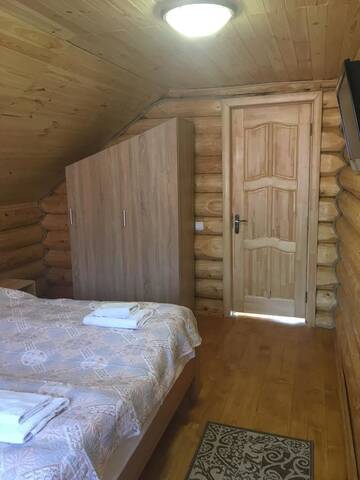Фото номера Дом с 2 спальнями Дома для отпуска Smerekovyi Dvir г. Поляна 9
