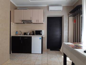 Фото номера Апартаменты - 1-й этаж Гостевой дом Polyana Aqua Resort г. Поляна 7