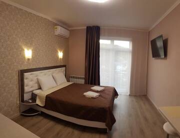 Фото номера Апартаменты-студио Гостевой дом Polyana Aqua Resort г. Поляна 2