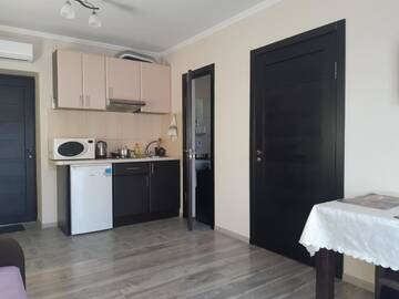 Фото номера Апартаменты с балконом Гостевой дом Polyana Aqua Resort г. Поляна 3
