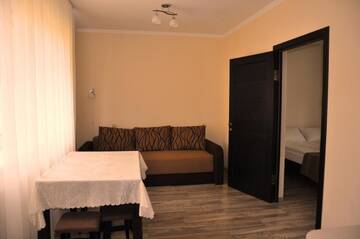 Фото номера Семейный люкс Гостевой дом Polyana Aqua Resort г. Поляна 5