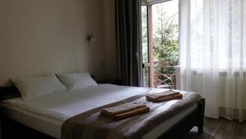 Фото номера Семейный люкс Гостевой дом Polyana Aqua Resort г. Поляна 8
