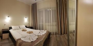 Фото номера Семейный люкс Гостевой дом Polyana Aqua Resort г. Поляна 6