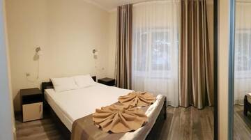 Фото номера Апартаменты с балконом Гостевой дом Polyana Aqua Resort г. Поляна 8