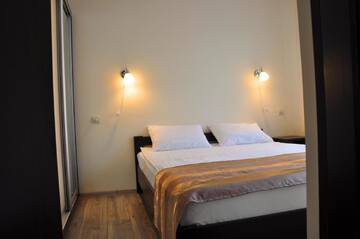 Фото номера Апартаменты с балконом Гостевой дом Polyana Aqua Resort г. Поляна 10