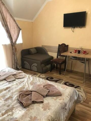 Фото номера Двухместный номер с 2 отдельными кроватями и балконом Мини-отель Вікторія г. Поляна 5