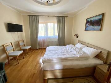 Фото номера Семейный полулюкс Загородные дома Guest house Mountain View г. Поляна 6