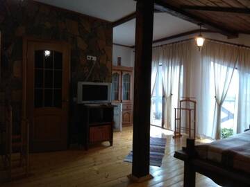 Фото номера Люкс с балконом Отель Chalet Vedmezhe г. Поляна 8