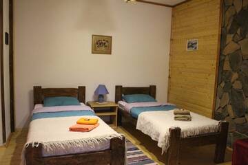 Фото номера Двухместный номер Делюкс с 2 отдельными кроватями Отель Chalet Vedmezhe г. Поляна 6
