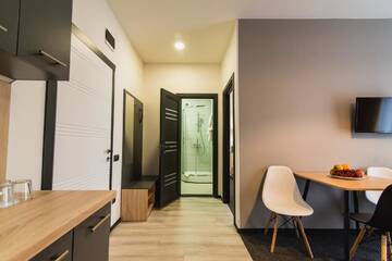 Фото номера Апартаменты Делюкс Отель Arena Apart - Hotel г. Поляна 4